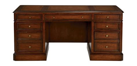 If the afternoon sun is so bright that you have glare on your monitor, or if you have to sit with your back to a window, invest in drapery you can pull closed as needed. . Ethan allen desks
